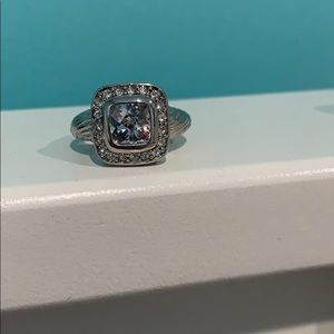 GREY RING WITH HEART DETAILS ON THE SIDES